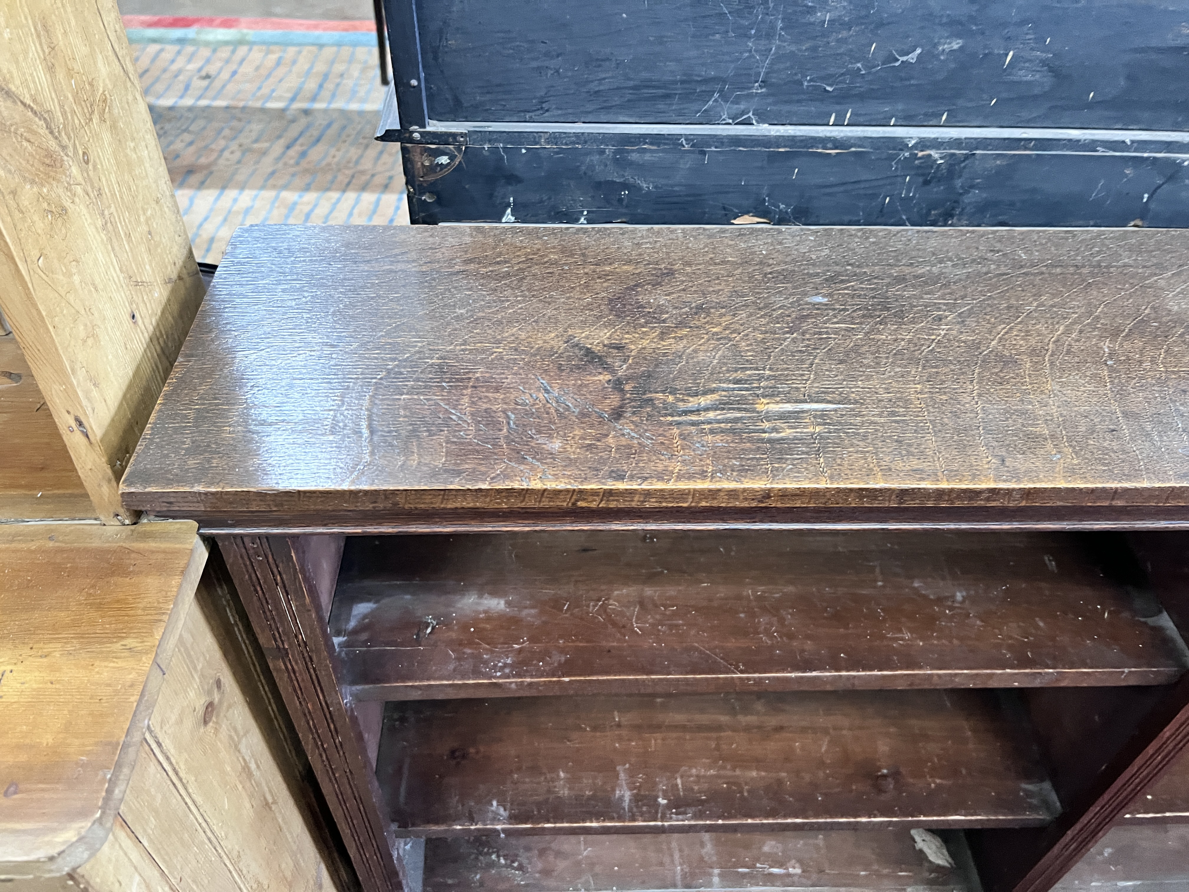 An early 20th century oak open dwarf bookcase, width 160cm, depth 28cm, height 91cm